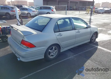 2002 Mitsubishi Lancer Oz Rally из США, поврежденный, VIN JA3AJ86E42U017591